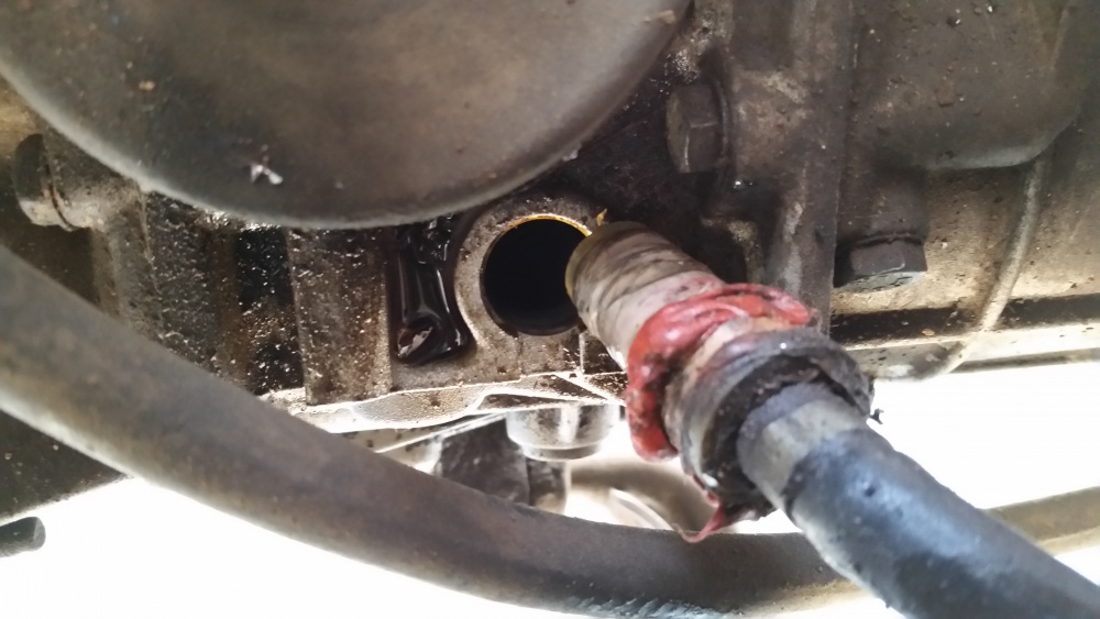 How to fix transmission fluid coming out of vent tube