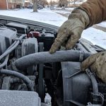 Frozen car coolant hose during a Denver winter